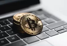 digital currency bitcoin on a laptop
